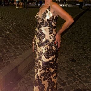 Small cheetah dress, great quality and slinky material; tied back